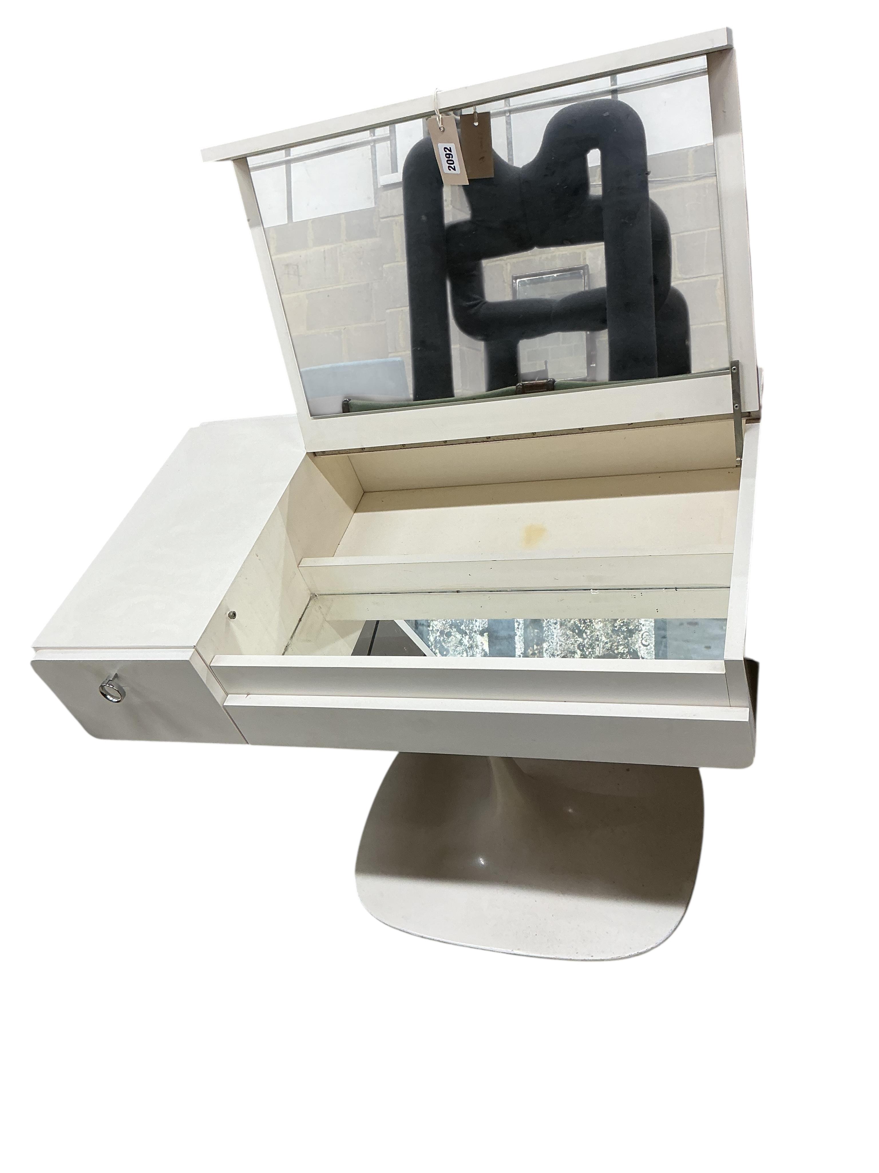 A 1960’s white tulip base dressing table, width 84cm, depth 48cm, height 66cm